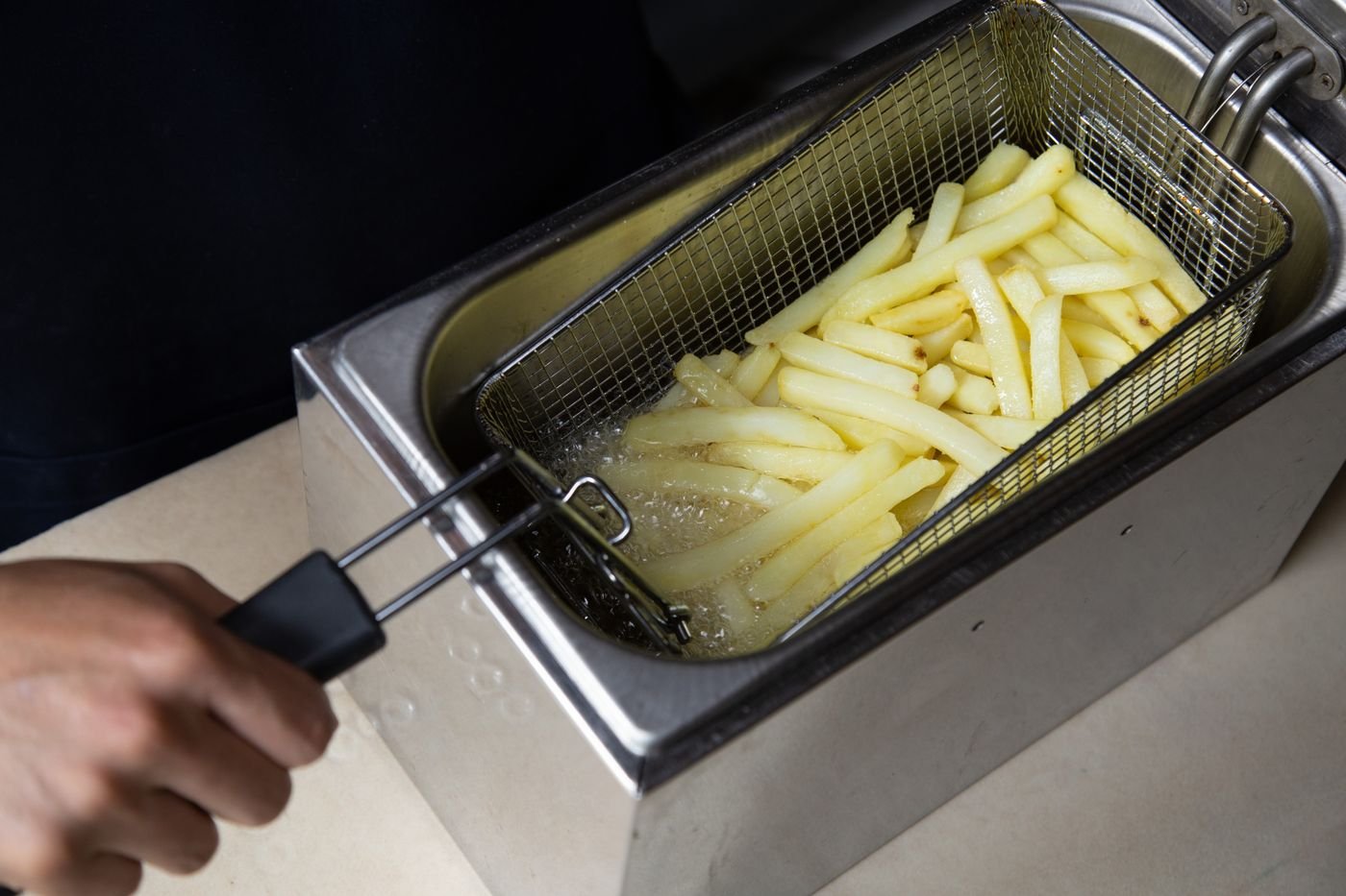 Food being deep fried in cooking oil
